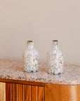 Speckled White Glass Bottle